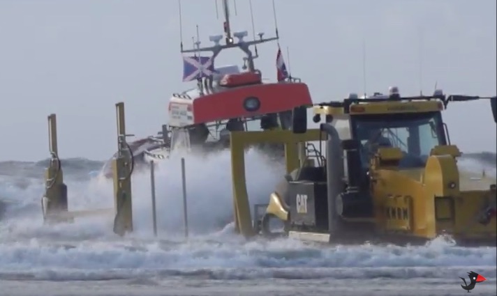 This Caterpillar Challenger Tractor And Special Trailer Designed For Beach Launching Life Boats Are Totally Awesome