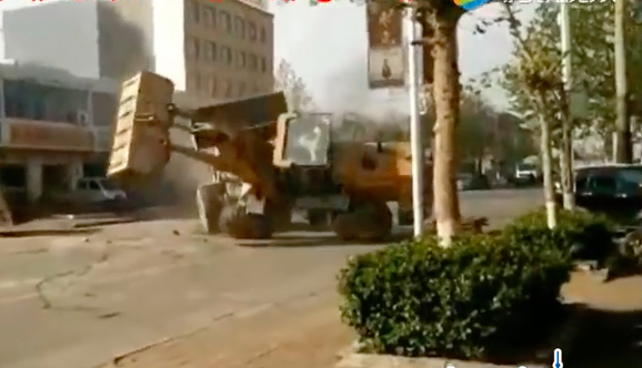 Chinese Contractors Settle A Dispute Over A Job With A Front End Loader Fight!