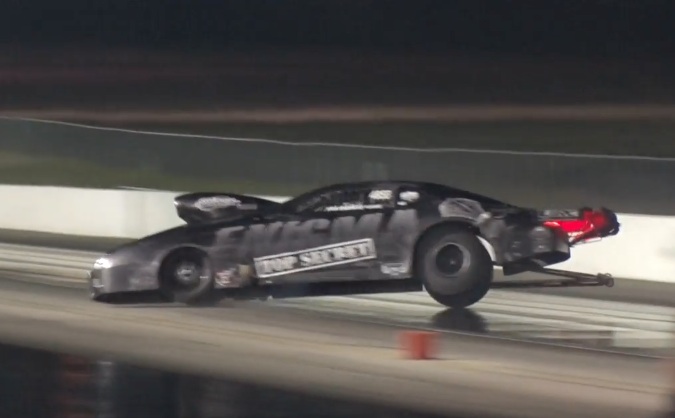 Check Out The Wild Ride That Brandon Pesz Goes On In Keith Haney’s Nitrous Camaro – Nearly Flips It Before Riding The Barrier!