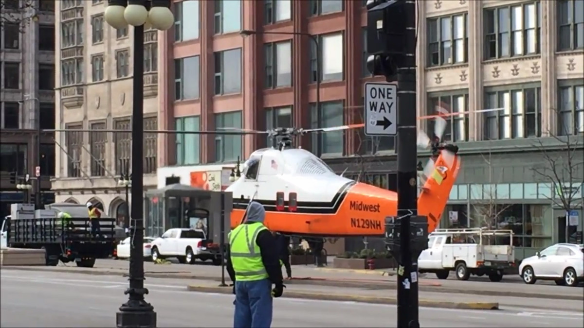 Air Muscle: Watch a classic helicopter do some low-margin heavy lifting among the high-rises of downtown Chicago