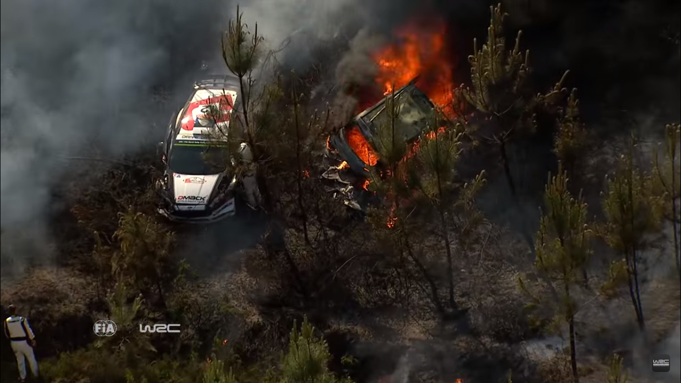 Two rally cars crash into same section of woods, which promptly catches on fire