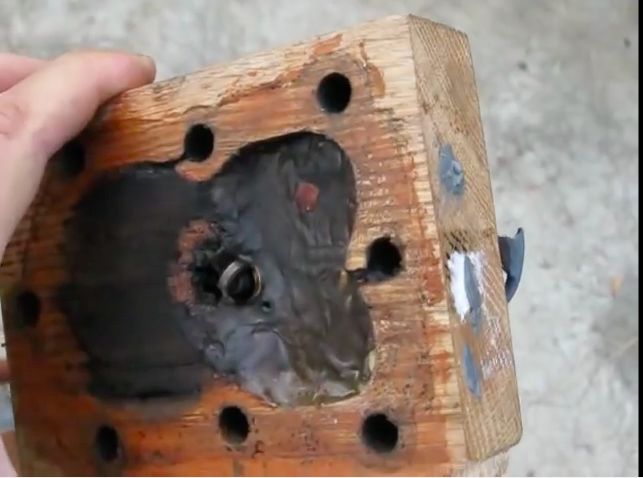 Weird Science: Watch This Guy Fire Up A Small Engine Topped With A Wooden Cylinder Head!