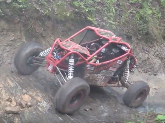 This Seven-Year-Old Can Wheel A Turbocharged RZR Up A Slick Hillclimb Just Fine!