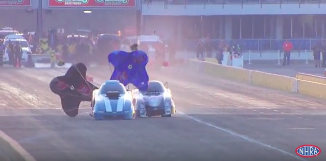 Watch Two Alky Funny Cars Come Within Inches Of Mashing Each Other At 260mph! Crazy!