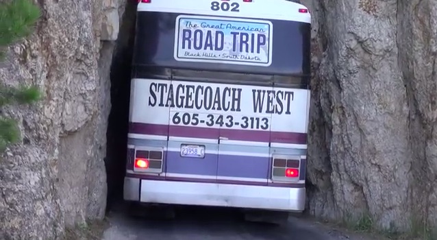 Bus Boss: Watch This Driver Get A Tour Bus Through An Impossibly Small Tunnel – Wow!