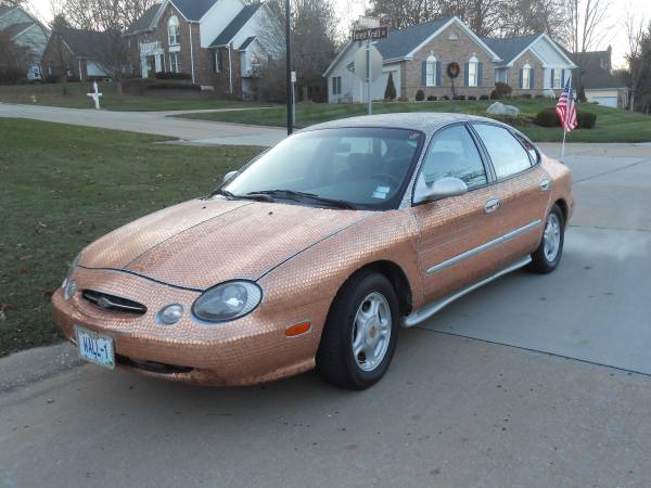 My Money Car: There’s A Guy Selling A 1998 Ford Taurus That He Glued Nickles and Pennies To For $34,500