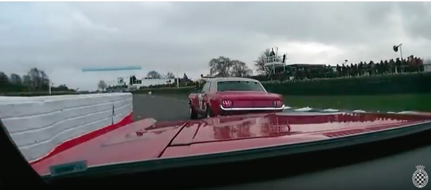 Watch A Pair Of 1965 Mustangs Slice and Dice At Goodwood – Contact And Someone In The Grass