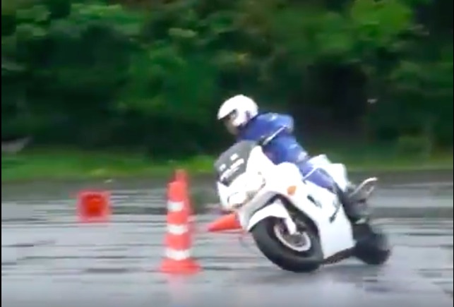 This Japanese Motorcycle Cop Has Skills! Watch Him Work The Cones In The Soaking Wet!