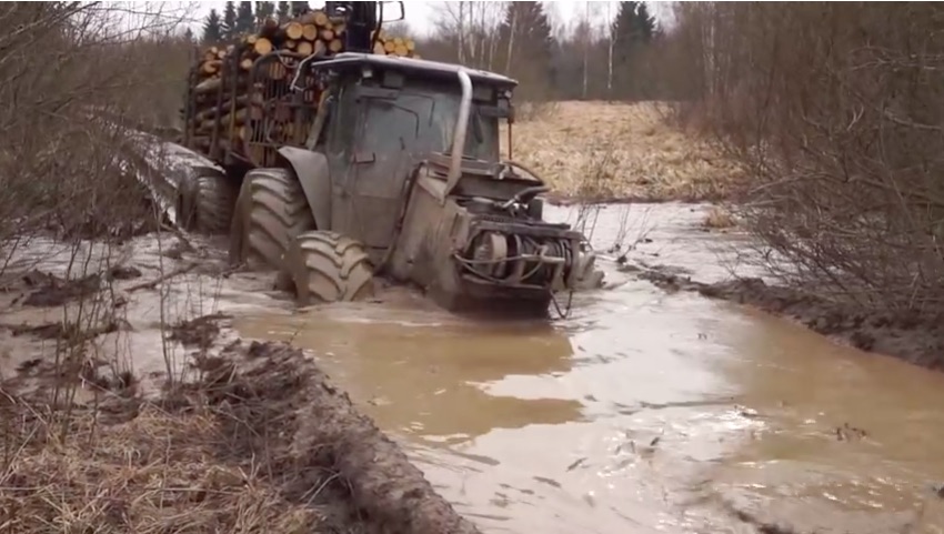 Dream Job? This Dude Gets Paid To Go Mud Bogging Every Day In A Tough Tractor