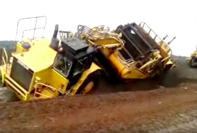 Scraper Save: Watch The Operator Of This Caterpillar Scraper Get Himself Into And Out Of Trouble