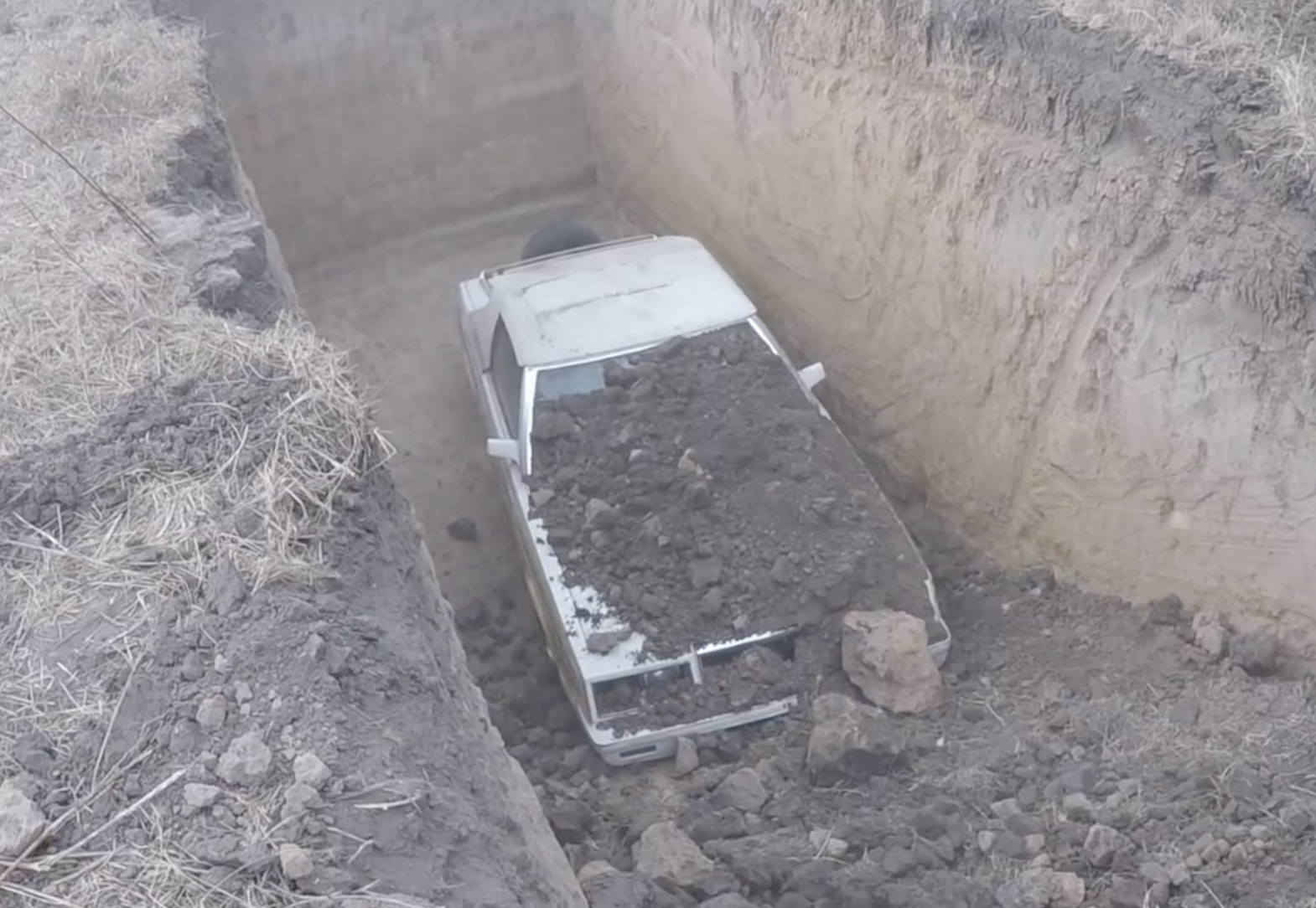 It’s Better This Way: Watch As This Chrysler LeBaron Droptop Gets Buried For Being A POS!