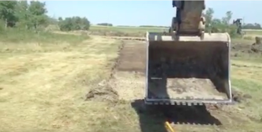 Mad Skills Yo: Watch This Excavator Operator Literally Plant His Stake With The Bucket