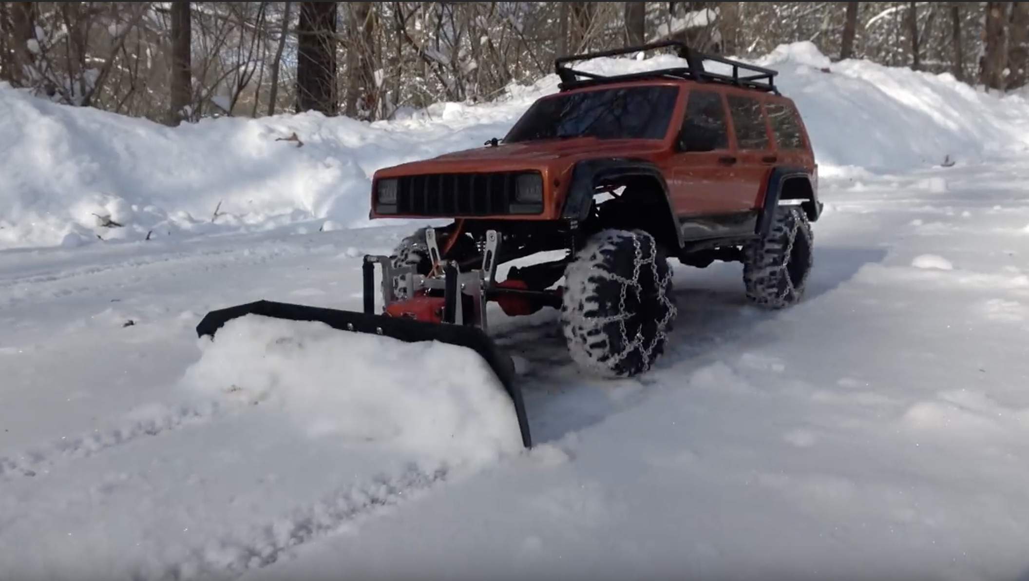 A Thoughtful Gift: A Remote-Controlled XJ Cherokee Snowplow!