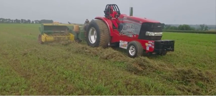 Impractical? Fooey! Watch This Pulling Tractor Take Care Of Multiple Jobs On The Farm!