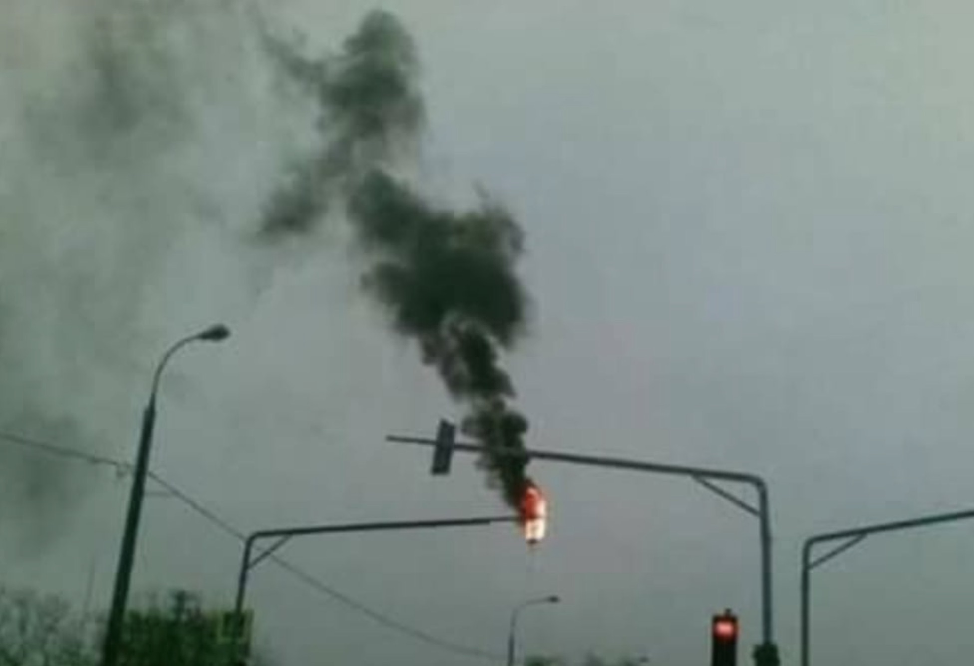 Caption This: There Wasn’t One Word About A Burning Traffic Light In That Stupid Little Handbook…