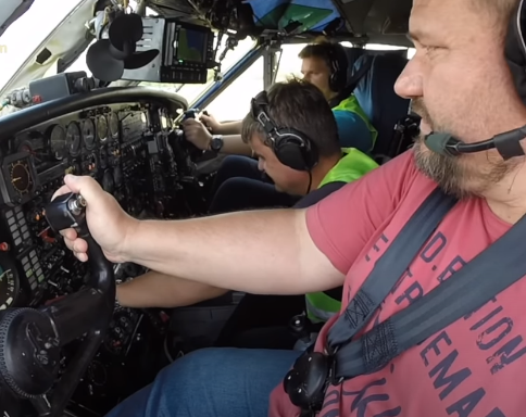 These Russian Dudes In T-Shirts Are Taking Off In An Antonov 12 Military Plane